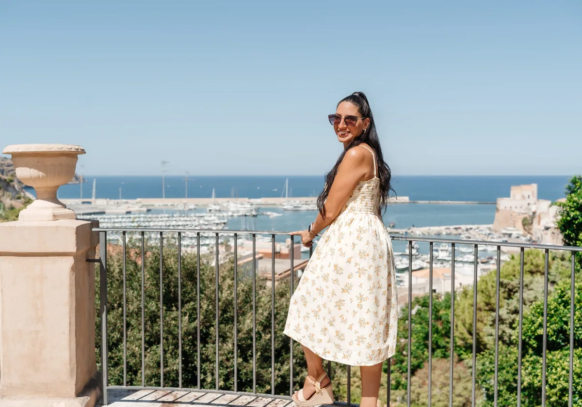 Carla on a terrace above the marina at Castellammare del Golfo